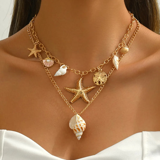 Collana con ciondolo a forma di conchiglia, stella marina, conchiglia estiva, in metallo bohémien, colore oro, elegante.