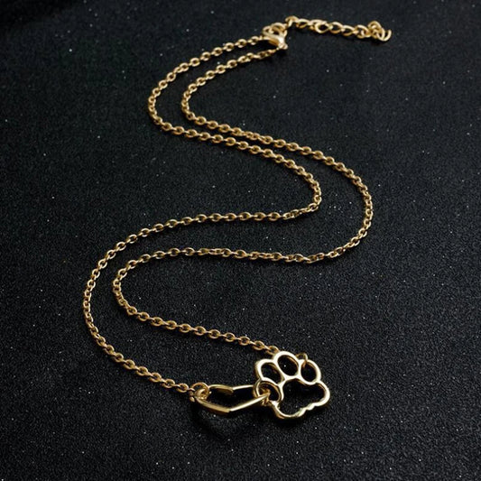 Collana con ciondolo a forma di cuore e impronta di cane in acciaio inossidabile placcata in oro 18 carati.